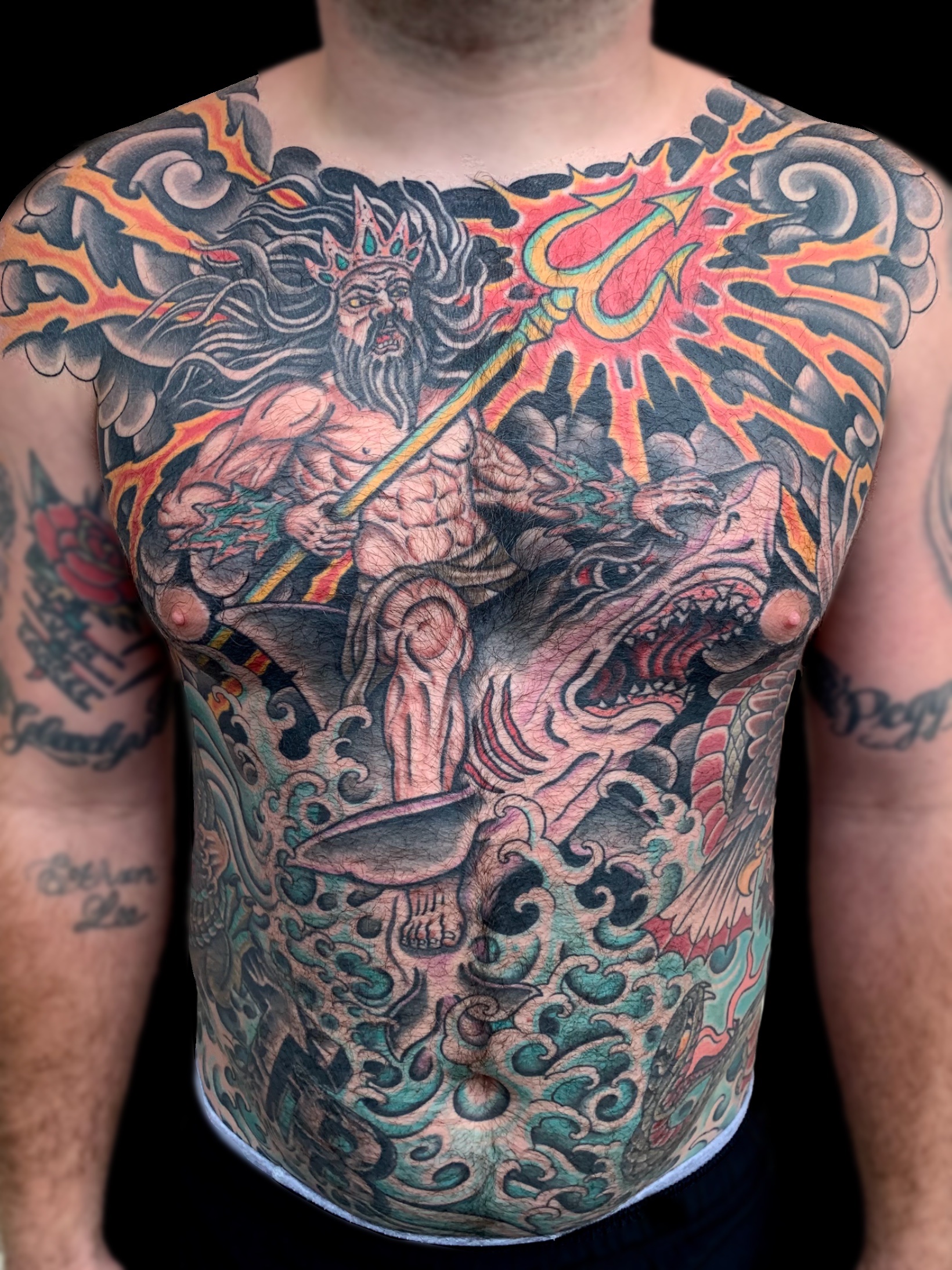 Full front Poseidon riding a shark tattoo