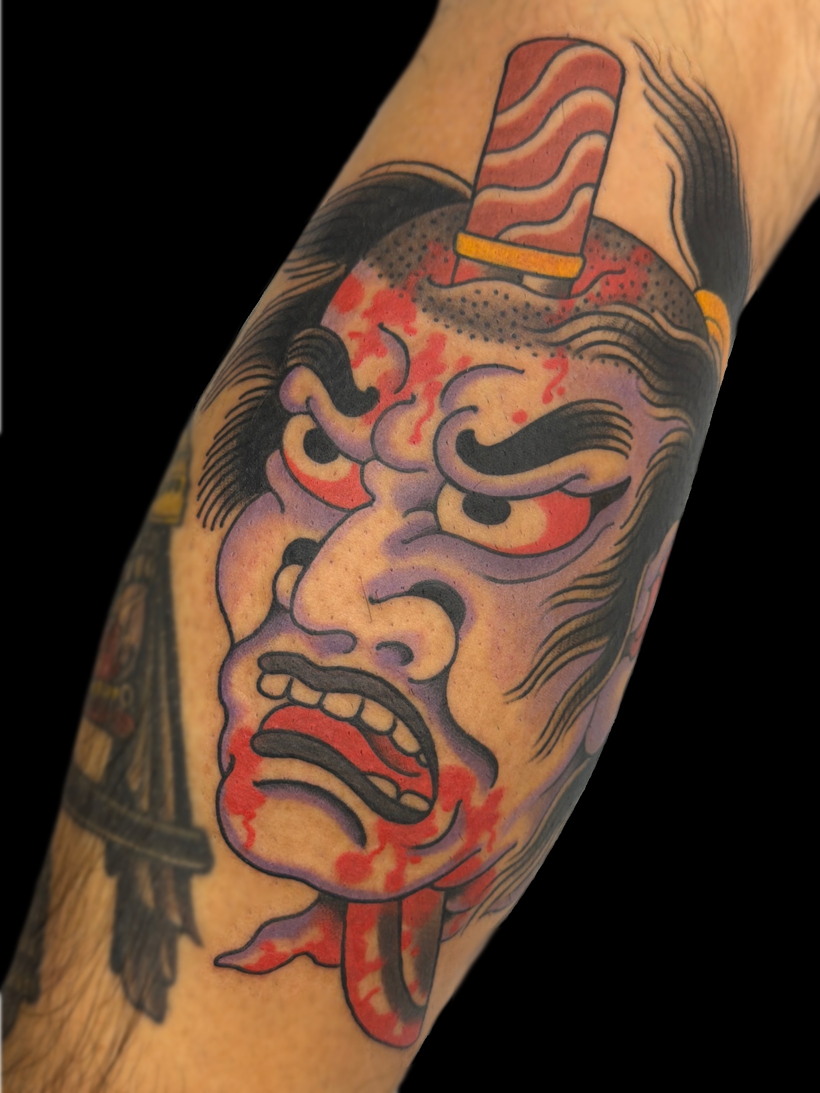 One shot traditional Japanese namakubi tattoo