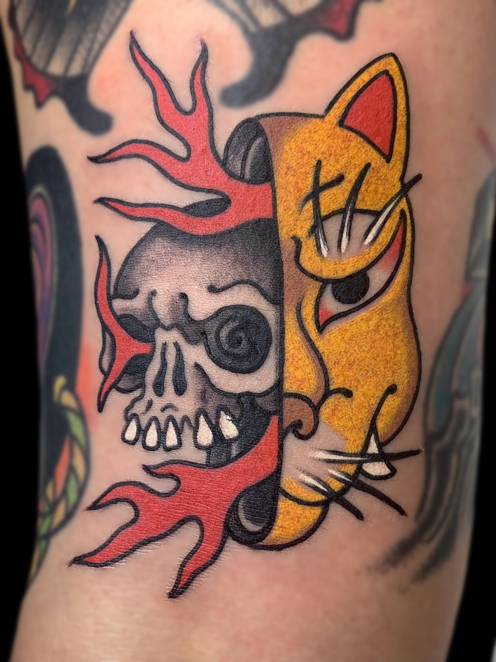 Traditional Japanese kitsune fox mask and skull with slakes tattoo